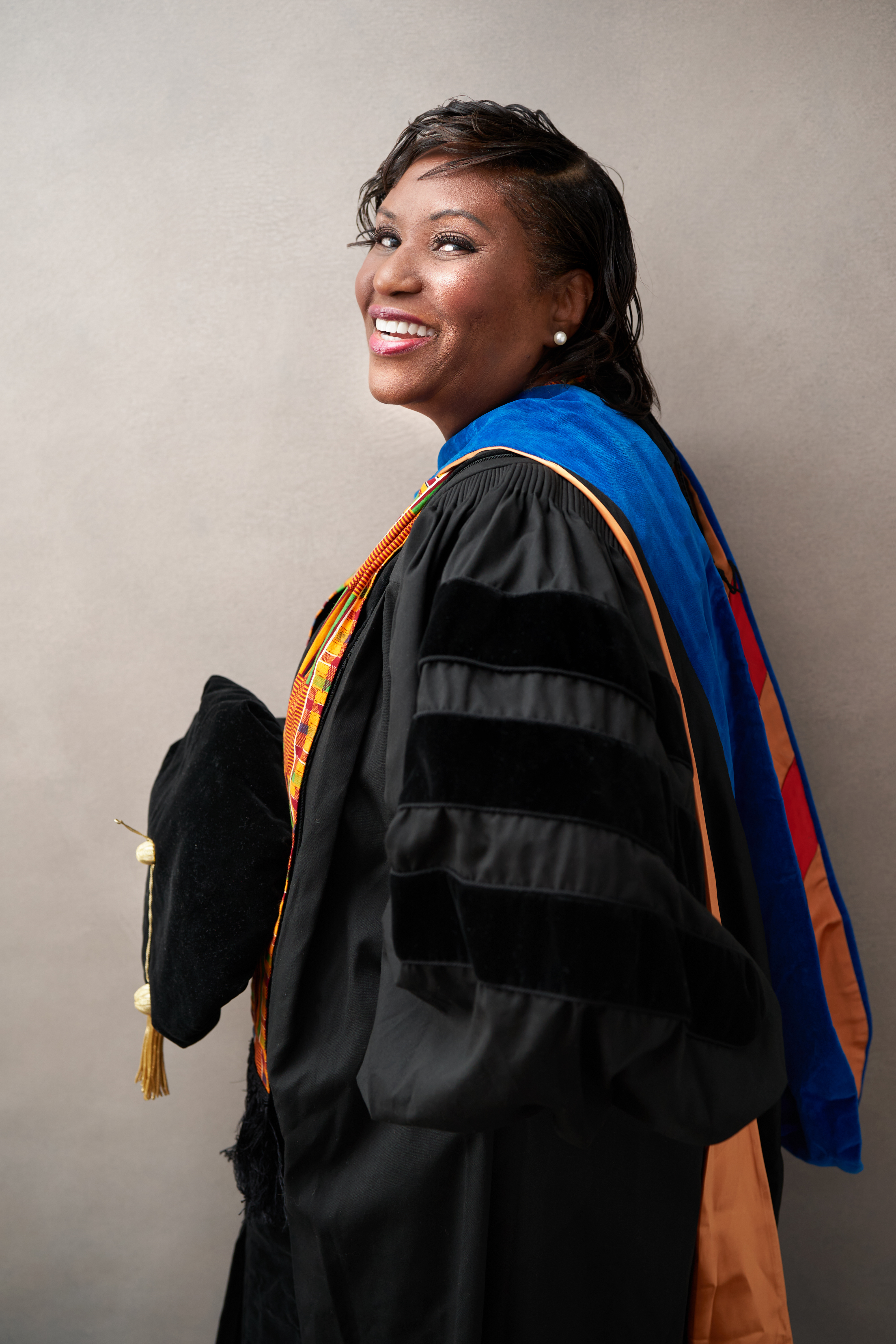 Dr West cap and gown photo